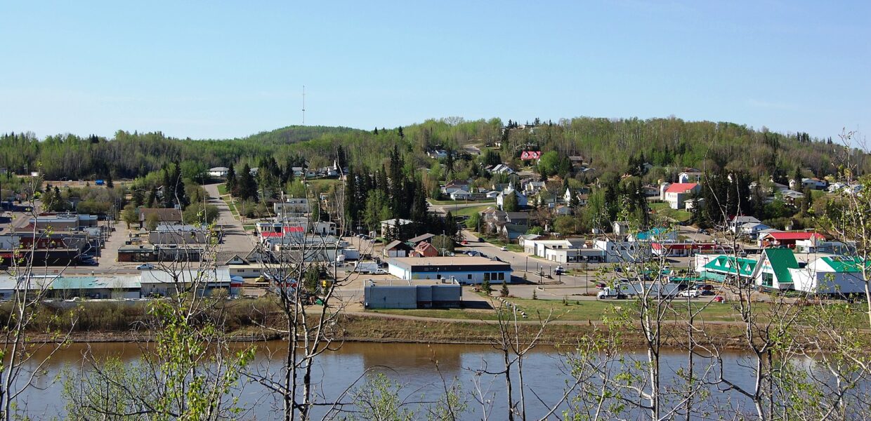 the town of Athabasca shot from across the river on a spring day