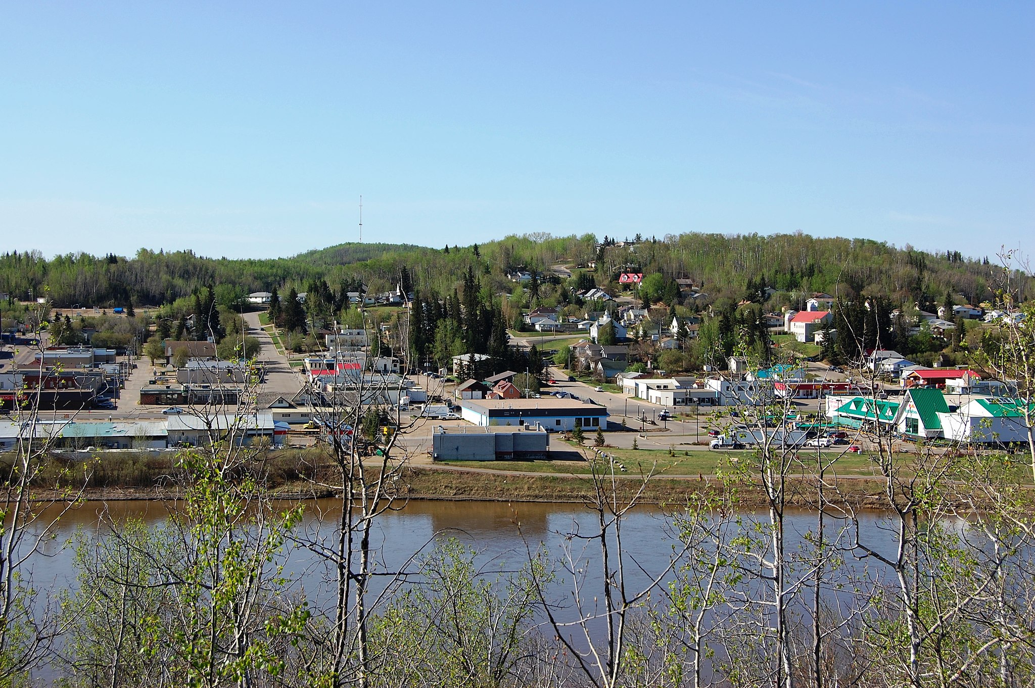 the town of Athabasca shot from across the river on a spring day